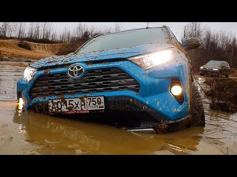Видео: ЖЕНСКИЙ OFF-ROAD. Новый VW TIGUAN против TOYOTA RAV4