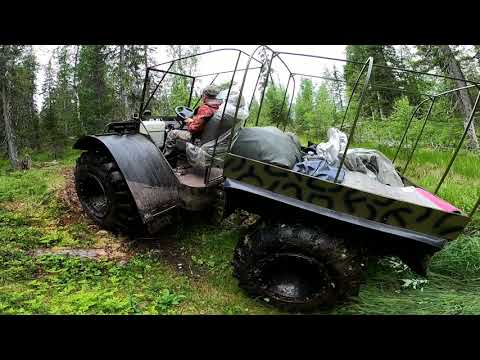 Видео: Пробираемся к реке на вездеходе застряли в болоте