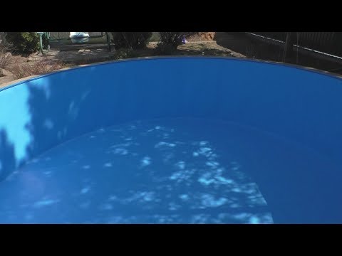 Видео: Каркасный бассейн. Монтаж пленки ПВХ