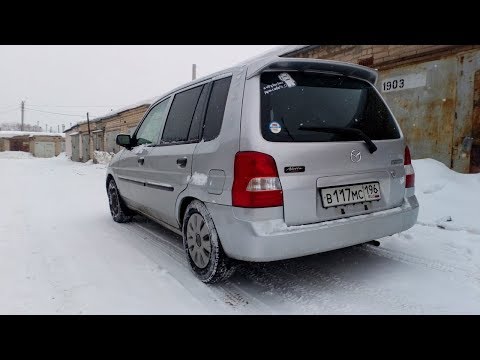 Видео: Замена крышки багажника на Mazda Demio