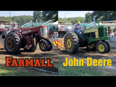 Видео: Farmall против John Deere | Старинный тракторный тягач