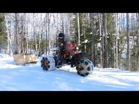 Видео: На самодельном трёхколёсном снегоходе за водой.
