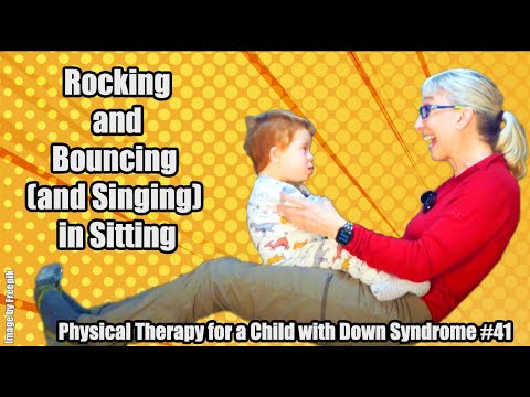 Видео: № 41. Раскачивание и подпрыгивание (и пение) сидя: физиотерапия для ребенка с синдромом Дауна