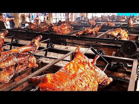 Видео: Фантастика фестивале свинина на ролике