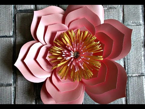 Видео: Цветы из дизайнерской бумаги
