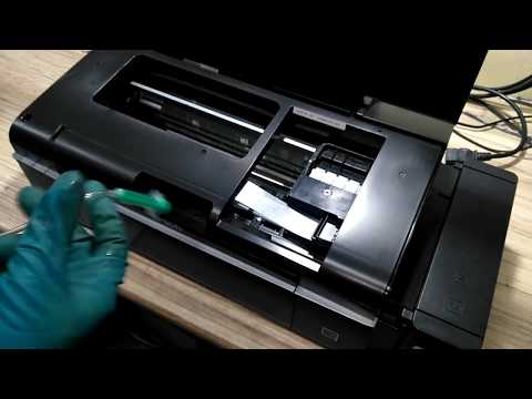 Видео: Инструкция чистка печатающей головки Epson L800