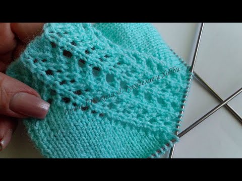 Видео: Дизайн регланной линии несложным элегантным ажурным узором спицами