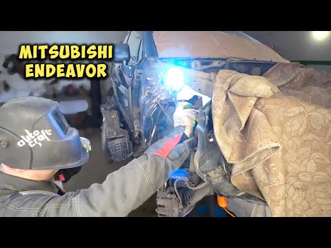 Видео: Mitsubishi ENDEAVOR Ремонт после аварии Body Repair