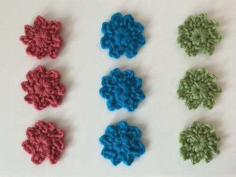 Видео: Как связать цветок крючком для начинающих