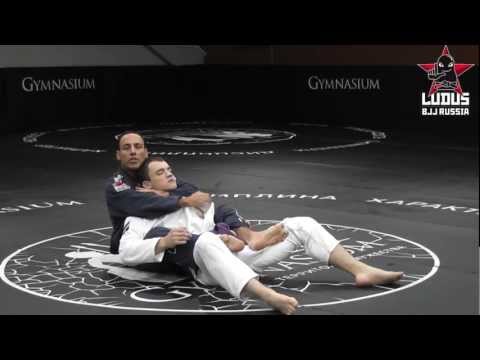 Видео: Школа БДД. Урок 11. Выход за спину из баттерфляй гарда