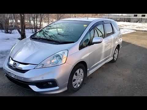 Видео: ОБЗОР HONDA FIT SHUTTLE 2013