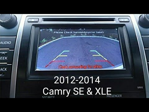 Видео: Установка камеры заднего вида на Camry SE и XLE 2012–2014 годов.