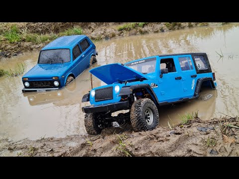 Видео: Советская НИВА 4х4 против JEEP Wrangler ... RC OFFroad 4x4