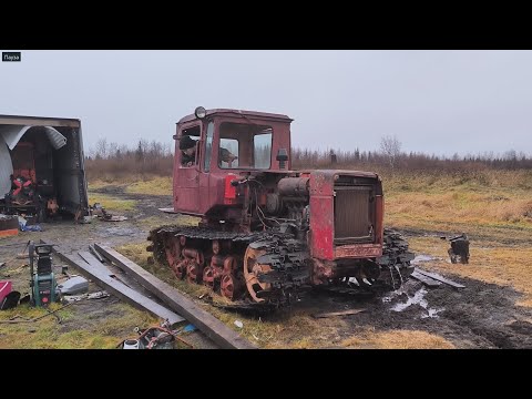 Видео: Дт-75Б Болотник.Надеваем гусеницы и выезжаем.