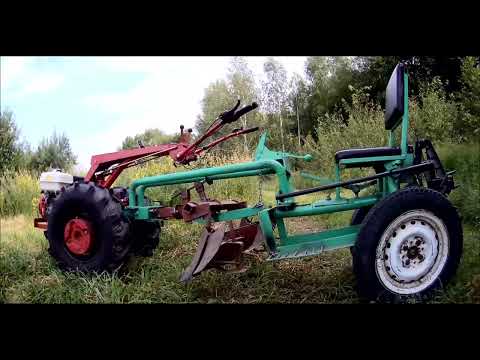 Видео: Мотоблок МТЗ, рыхление, прополка и окучивание картофеля