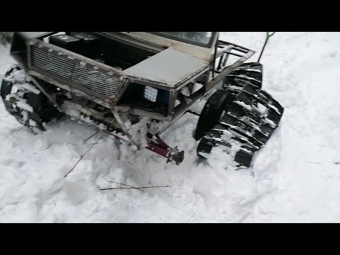 Видео: Самодельный гусеничный вездеход. Поломка в лесу. Как очистить снег с траков.