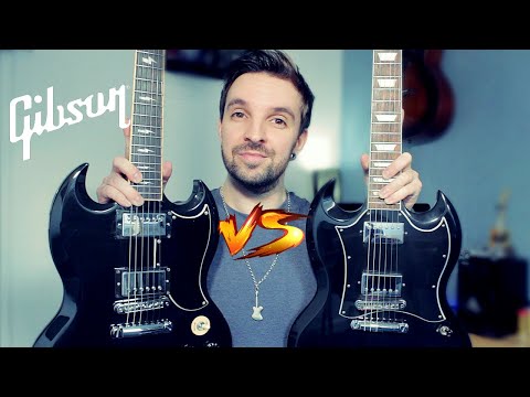 Видео: Gibson SG Angus Young Signature против Gibson SG Standard!