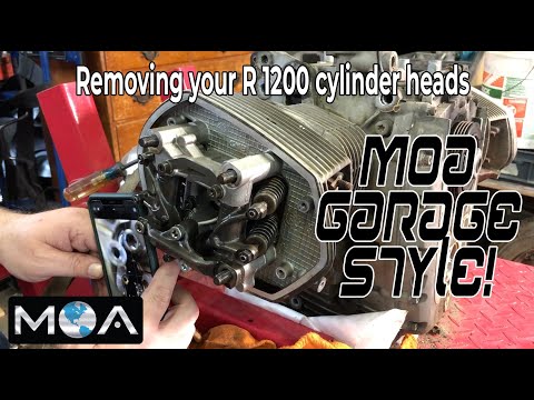 Видео: Разборка BMW R 1200 GS: снятие головки блока цилиндров