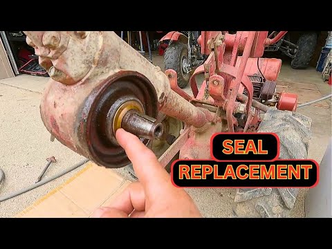 Видео: Замена уплотнителя цапфы и оси колеса старого культиватора Troy-Bilt Horse