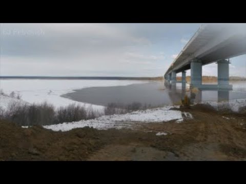 Видео: Климовский мост В порту строят забор,большие трубы,вид  с горы на работы в Верховском заливе.