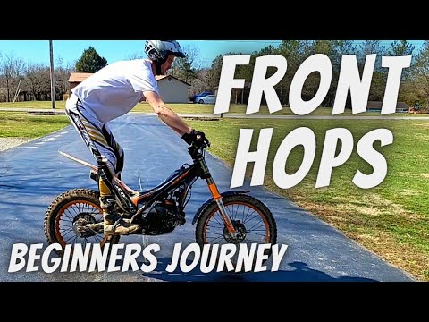 Видео: Прыжки на передних колесах — как я научился