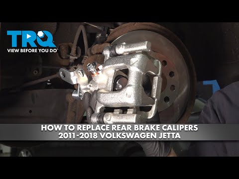 Видео: Как заменить задние тормозные суппорты на Volkswagen Jetta 2011-2018
