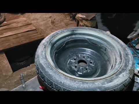 Видео: Установка автомобильного колеса на облегчённый Урал👍