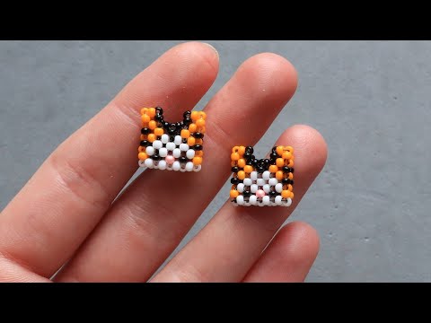 Видео: Фигурка котик из бисера в шапочке тигра в технике крестик