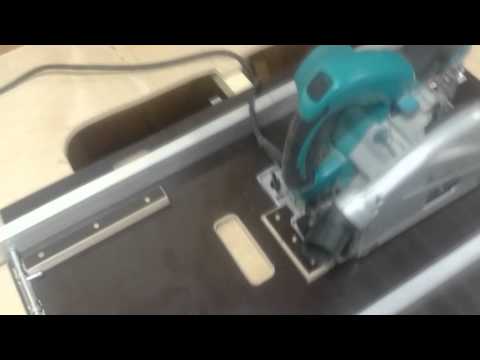 Видео: Быстросъемная фиксация погружной пилы SP6000  в столе