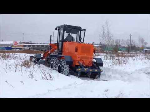 Видео: Автогрейдер ГС-14.20П с подключаемым передним мостом.