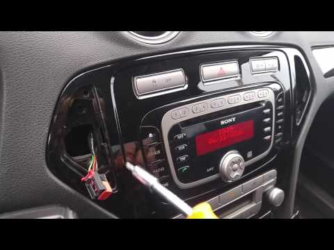 Видео: Форд Мондео 4. Замена лампочки прикуривателя