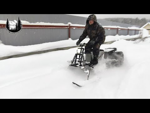 Видео: #Мотобуксировщик с лыжным модулем. Выезд по глубокому снегу.