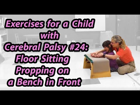 Видео: #24Сидеть с скрестив ноги, опираясь на руки спереди: упражнения для ребенка с церебральным параличом