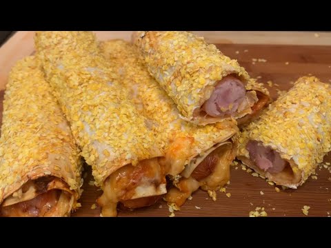 Видео: Сосиски в лаваше в духовке. Sausages in pita bread in the oven.