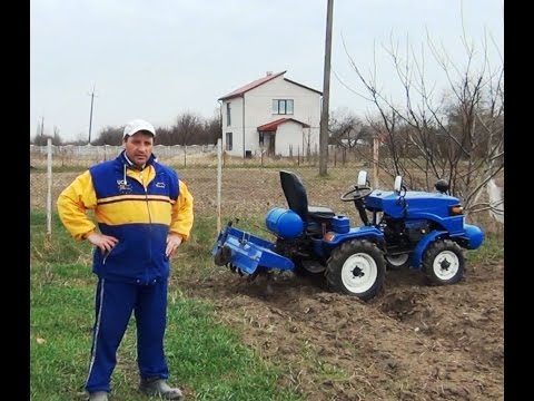 Видео: Минитрактор в работе культивация