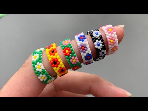Видео: Как сделать колечко с цветами из бисера в технике мозаика