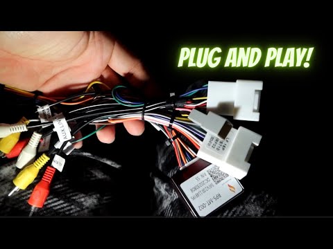 Видео: Как заставить нештатную магнитолу работать с штатной камерой заднего вида на Mitsubishi Lancer!