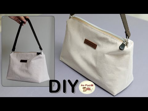 Видео: Как сделать сумочку на молнии.