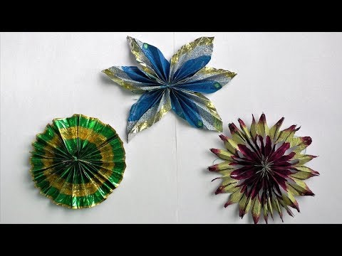 Видео: Объёмные снежинки из фантиков от конфет