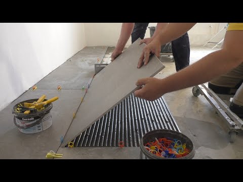 Видео: Как укладывать плитку крупного формата!