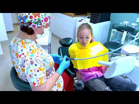 Видео: ПОХОД К СТОМАТОЛОГУ в Польше  #Пломбирование зуба/ Bubble Tea /Сразу пошли есть сладкое.