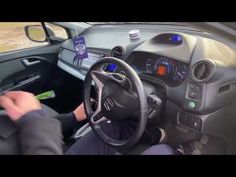 Видео: Обзор автомобиля Honda Insight в кузове ZE3