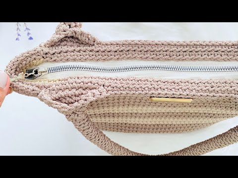Видео: как вшить молнию в вязаную сумку