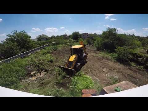 Видео: очистка участка спец техникой экскаватором погрузчиком