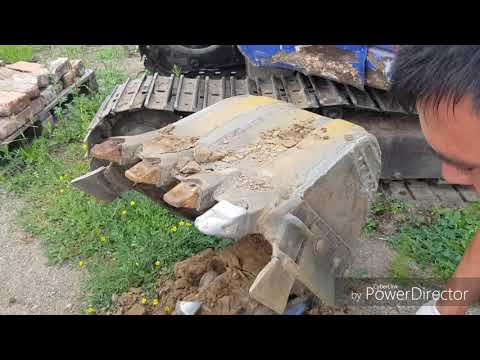 Видео: Ремонт ковша, замена коронок, боковых резцов
