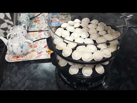 Видео: Варим пельмени в пароварке Tefal