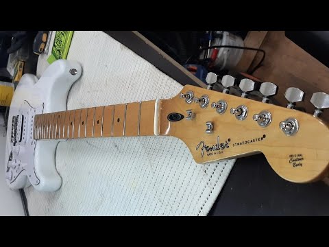 Видео: Fender Stratocaster USA 🇨🇳 Replica. Шлифовка ладов. замена порожка. Настройка.