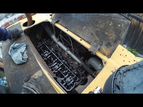 Видео: ДТ-75. Смотрим течь форсунок - меняем масло