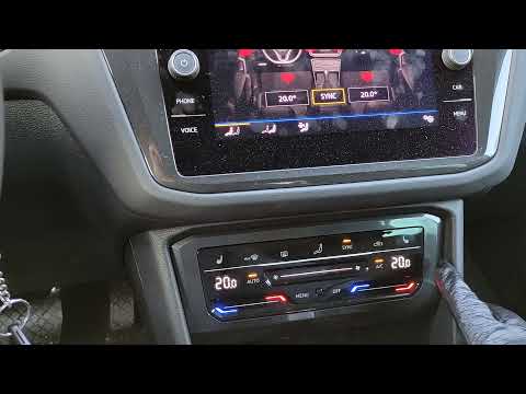 Видео: Зимняя эксплуатация VW Tiguan Status 2021. Пятиминутный обзор зимних опций.