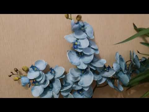 Видео: Видеоурок. Искусственная орхидея в кашпо с листьями